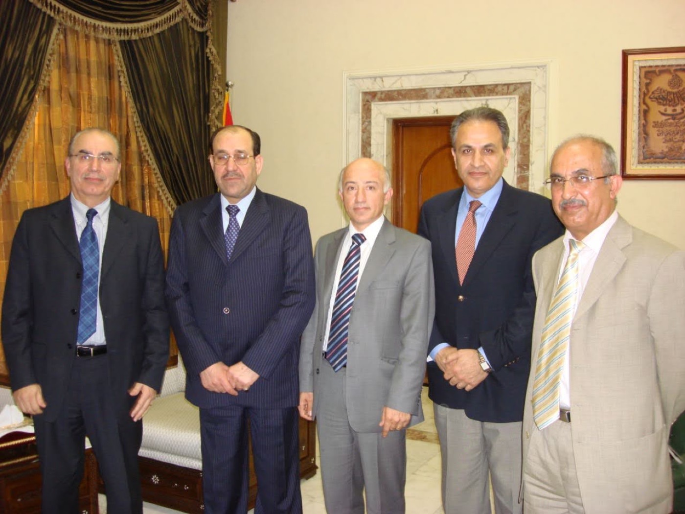 With Prime Minister Nouri al-Maliki (from left: Adel Matloob, Riyad Al-Mehaidi, Dlawer Abdul-Aziz, Nouri al-Maliki, Mohamed Al-Rubeai)... promises to benefit from "NISA" that were consigned to oblivion.