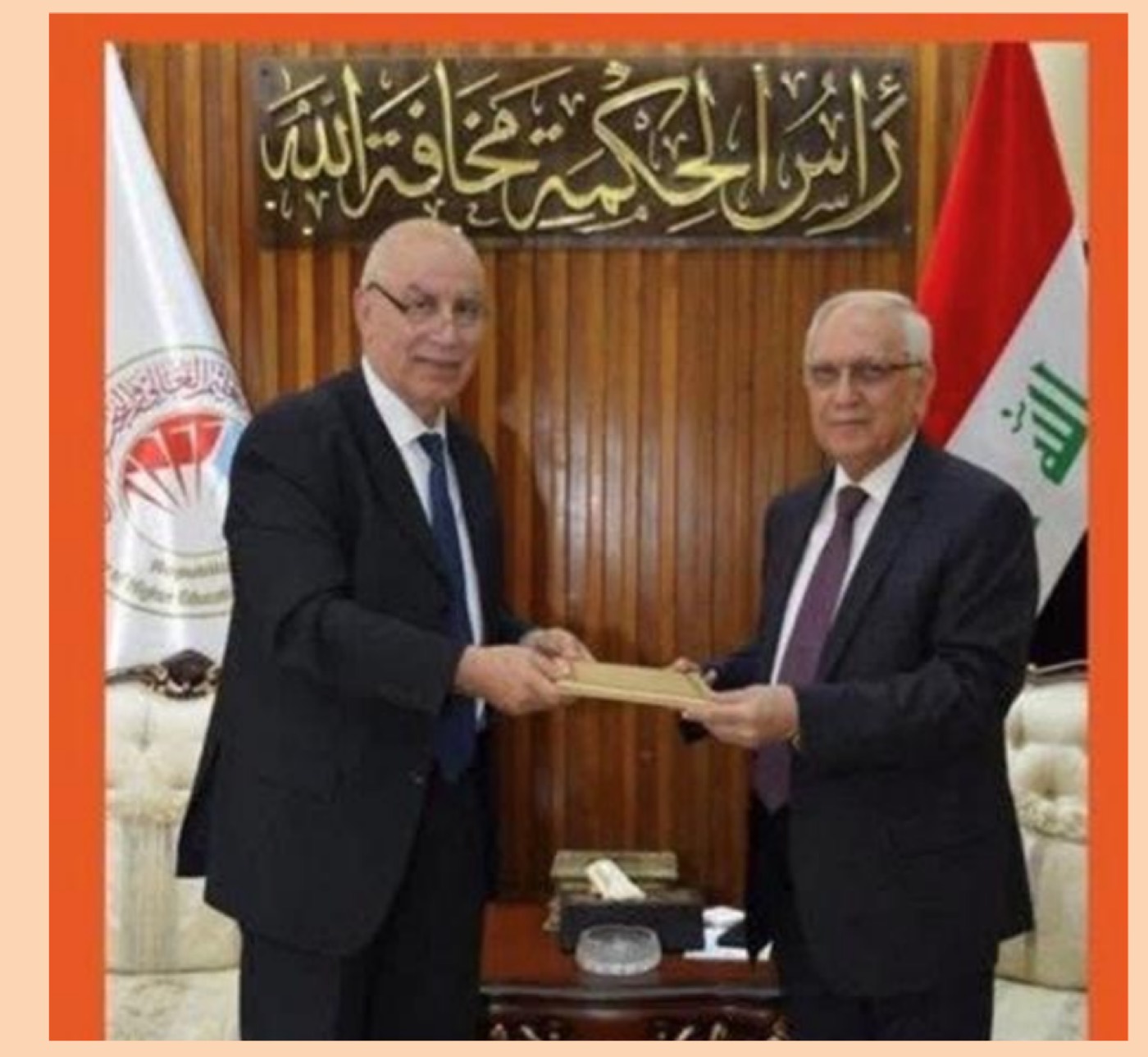 Exchanging the cooperation agreement between the Minister of Higher Education and Scientific Research, Prof. Dr. Abdul Razzaq Al-Issa, and Prof. Dr. Mohamed Al-Rubeai, President of the Network of Iraqi Scientists Abroad (NISA)